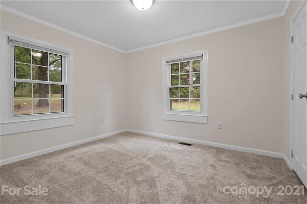 2665 Holbrook Road Fort Mill, SC 29715 - Photo 30 of 44 a view of an empty room with a window