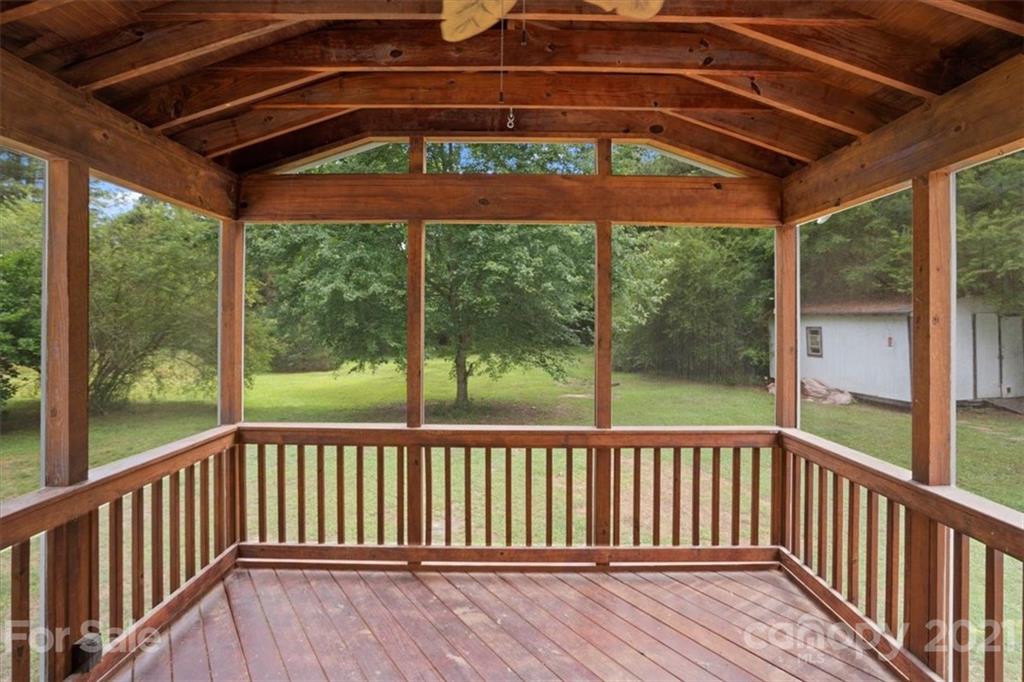 2665 Holbrook Road Fort Mill, SC 29715 - Photo 34 of 44 a view of a wooden deck with a yard