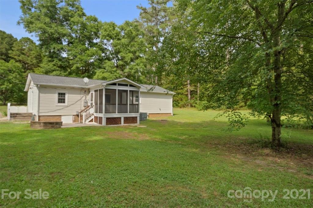 2665 Holbrook Road Fort Mill, SC 29715 - Photo 39 of 44 a front view of a house with a garden