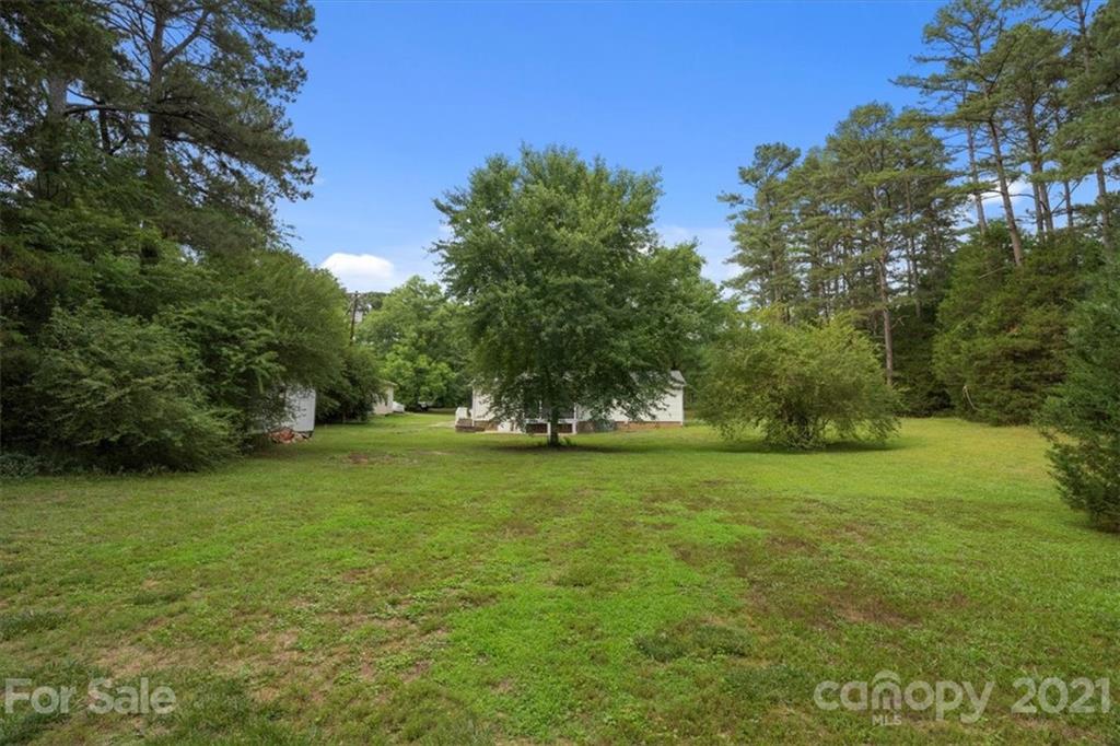 2665 Holbrook Road Fort Mill, SC 29715 - Photo 43 of 44 a view of outdoor space with deck and yard