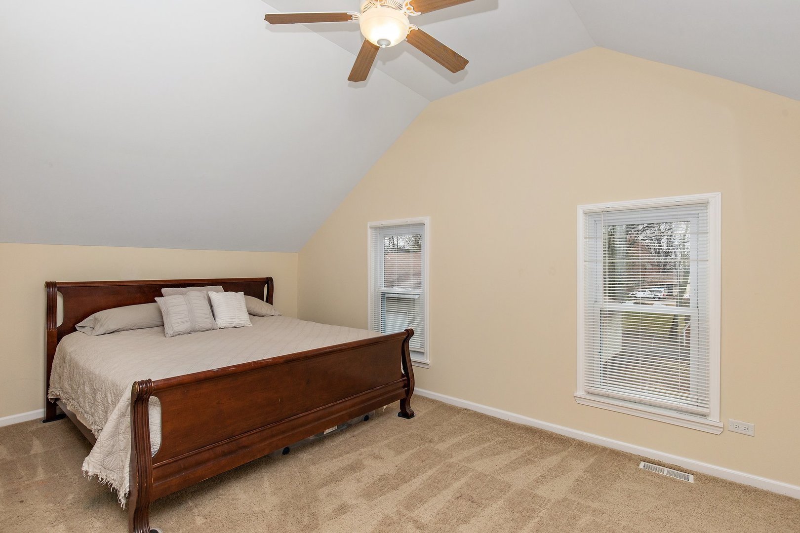 162 Park Street Hampshire, IL 60140 - Photo 12 of 25 a bed sitting in a bedroom next to a window