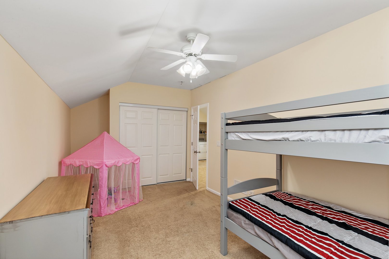 162 Park Street Hampshire, IL 60140 - Photo 16 of 25 a living room with a piano and a ceiling fan