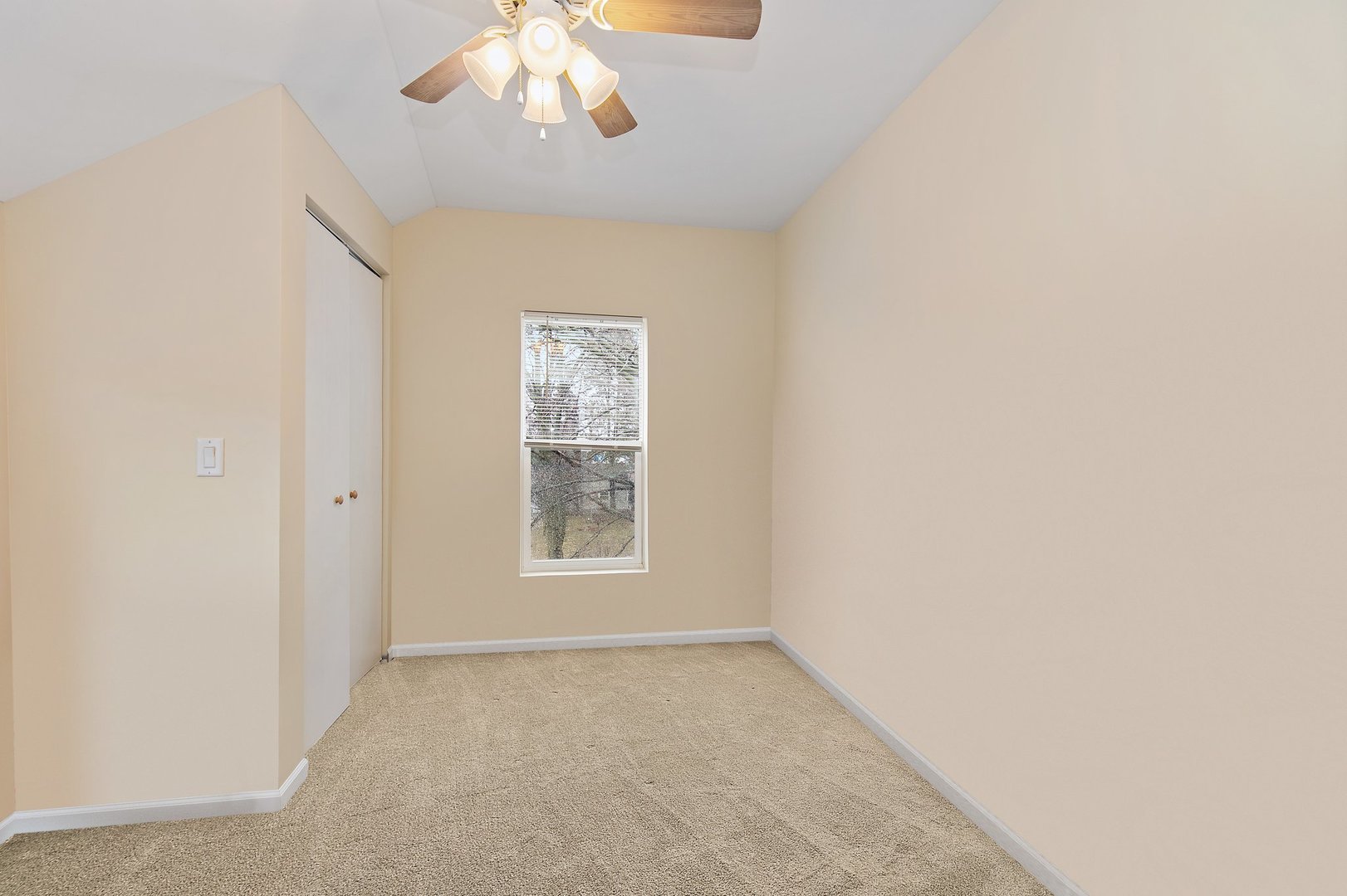 162 Park Street Hampshire, IL 60140 - Photo 17 of 25 an empty room with windows and chandelier