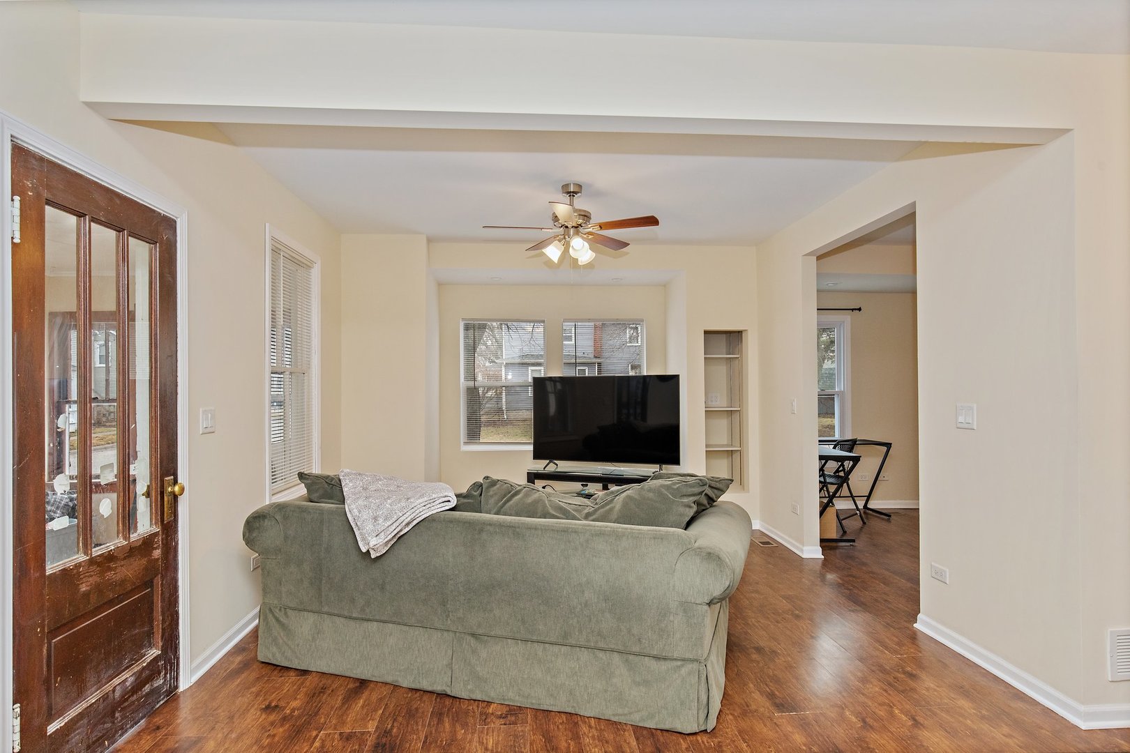 162 Park Street Hampshire, IL 60140 - Photo 2 of 25 a living room with furniture and a flat screen tv