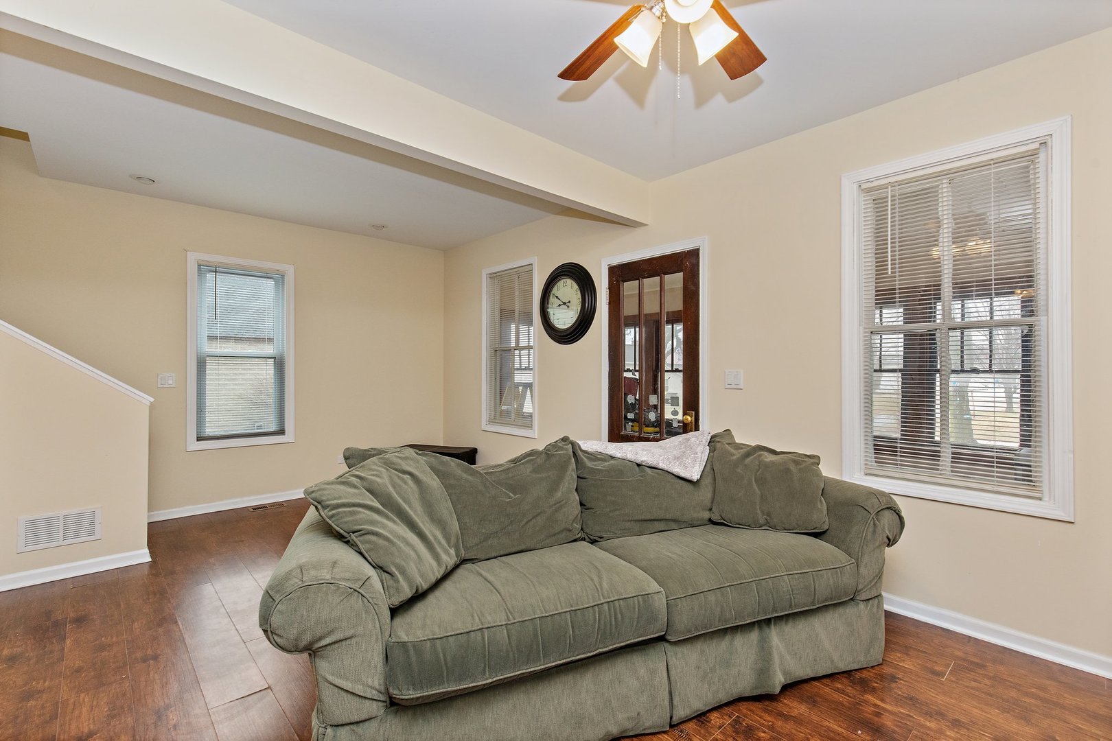 162 Park Street Hampshire, IL 60140 - Photo 6 of 25 a living room with furniture and a large window
