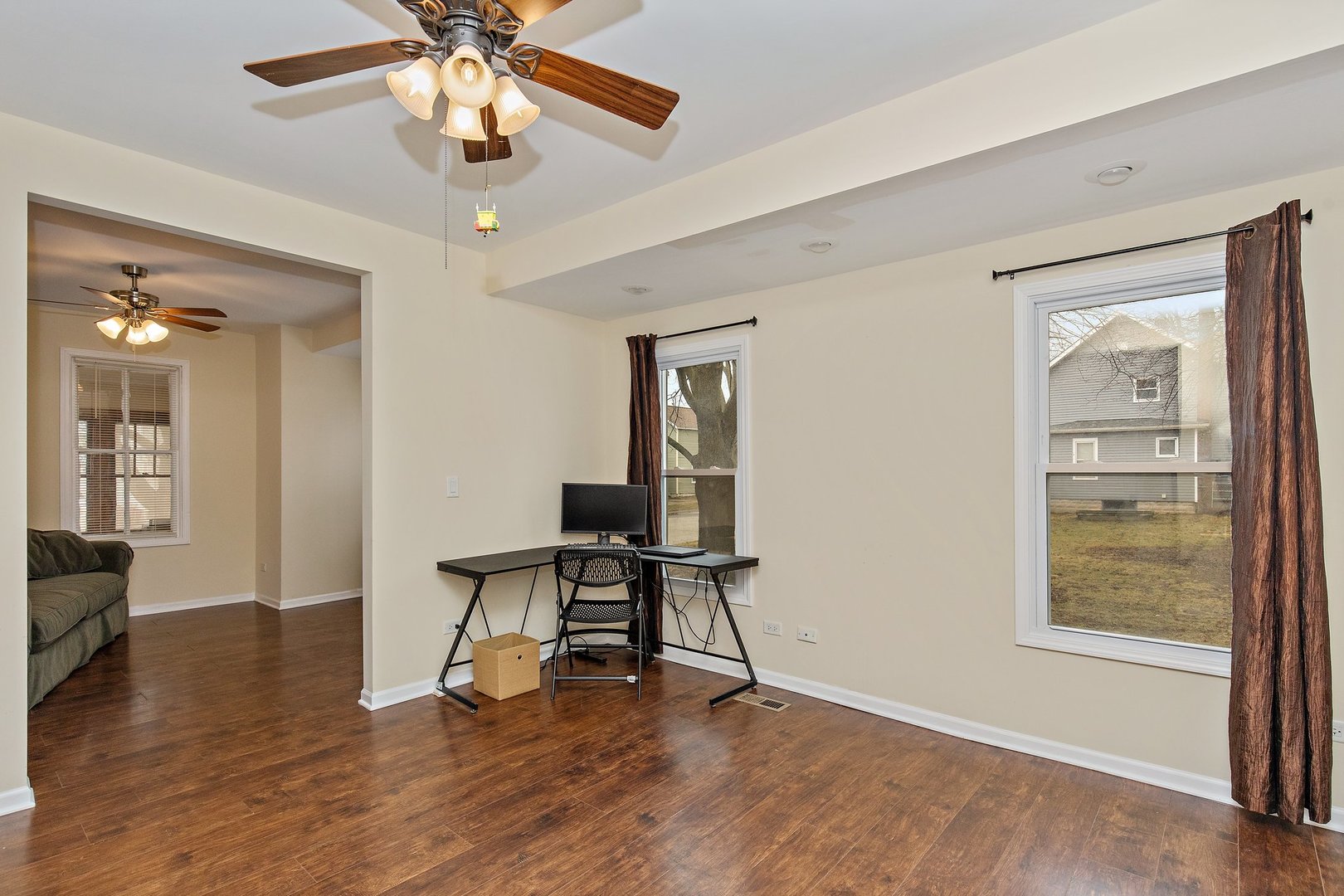 162 Park Street Hampshire, IL 60140 - Photo 7 of 25 a view of a livingroom with furniture and a workspace