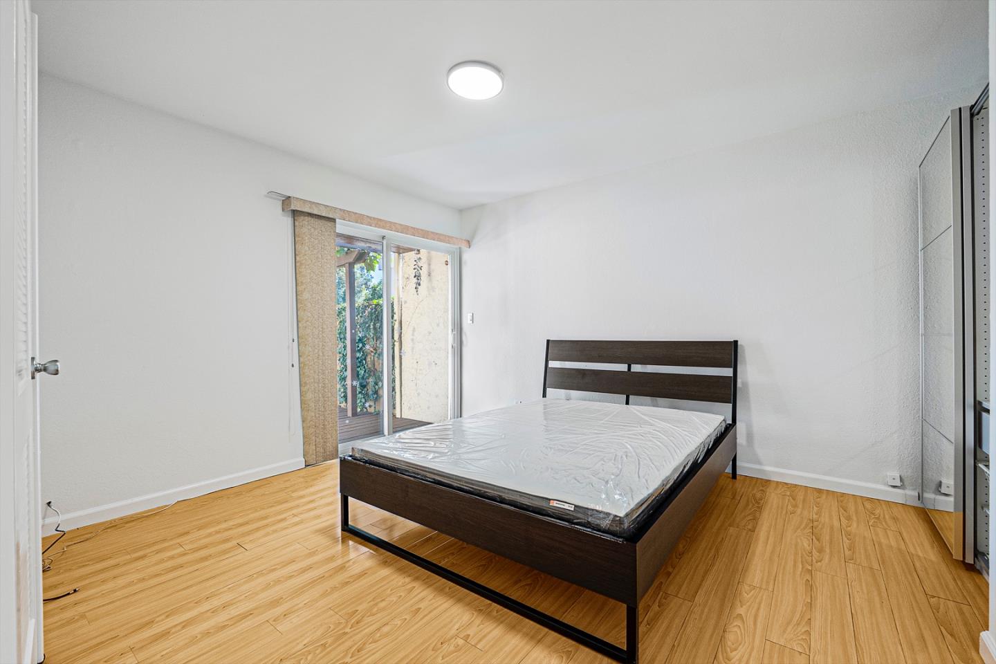 3691 Dryden Road Fremont, CA 94555 - Photo 14 of 26 a room with a bed and a window
