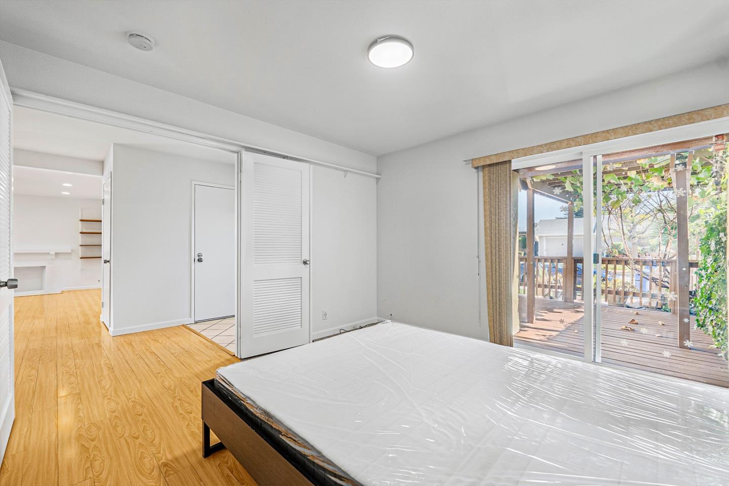 3691 Dryden Road Fremont, CA 94555 - Photo 15 of 26 a bedroom with a bed and a large window
