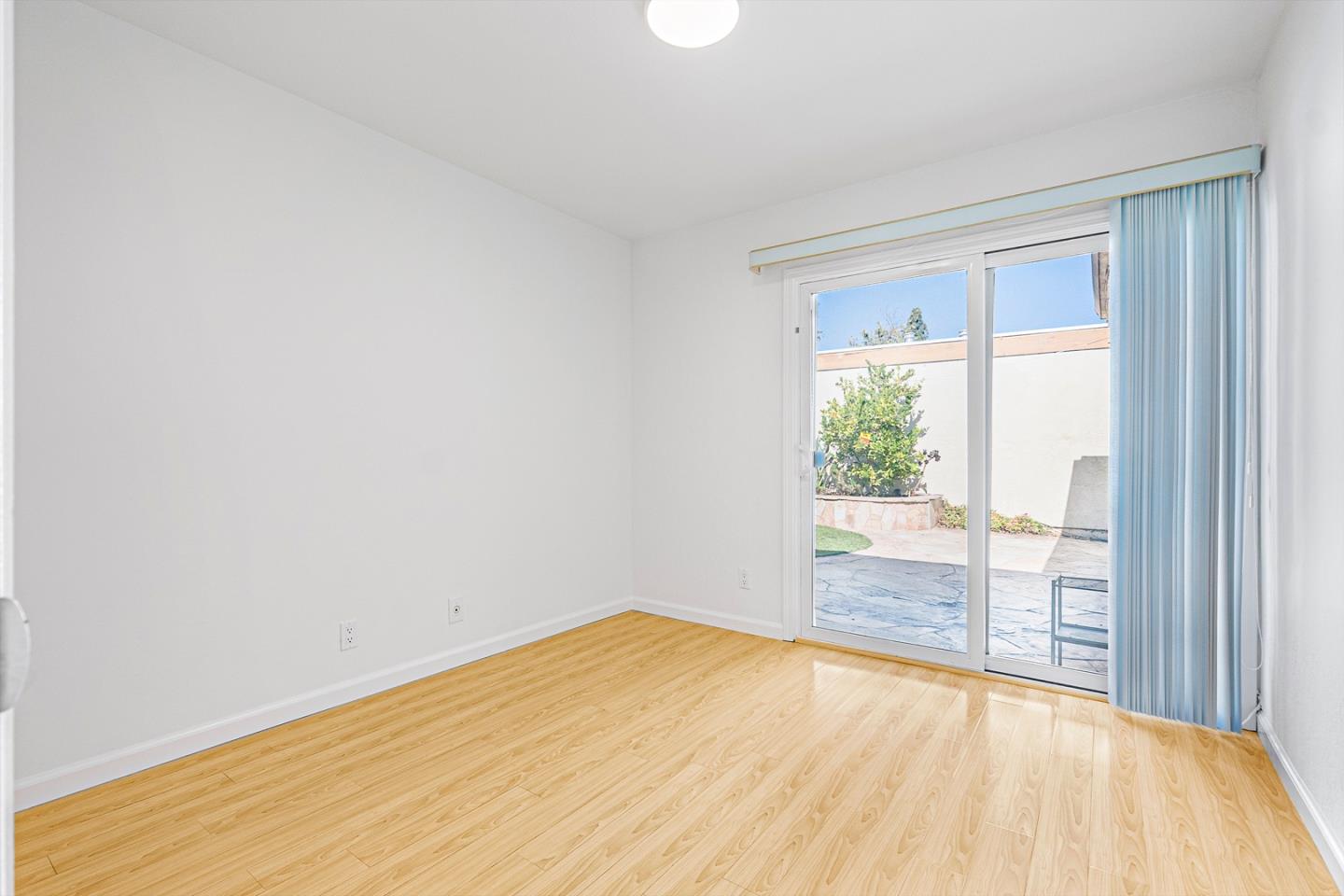 3691 Dryden Road Fremont, CA 94555 - Photo 18 of 26 a view of a room with wooden floor and a window