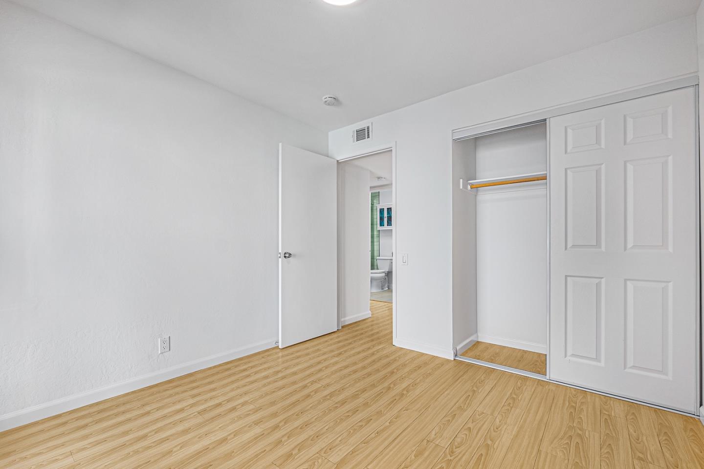 3691 Dryden Road Fremont, CA 94555 - Photo 19 of 26 a view of an empty room with wooden floor
