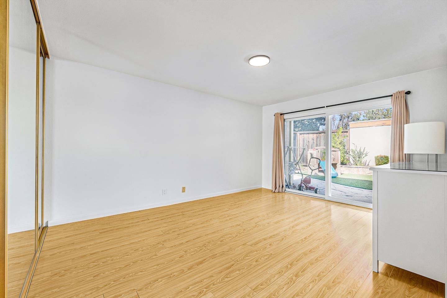 3691 Dryden Road Fremont, CA 94555 - Photo 20 of 26 a view of an empty room and wooden floor