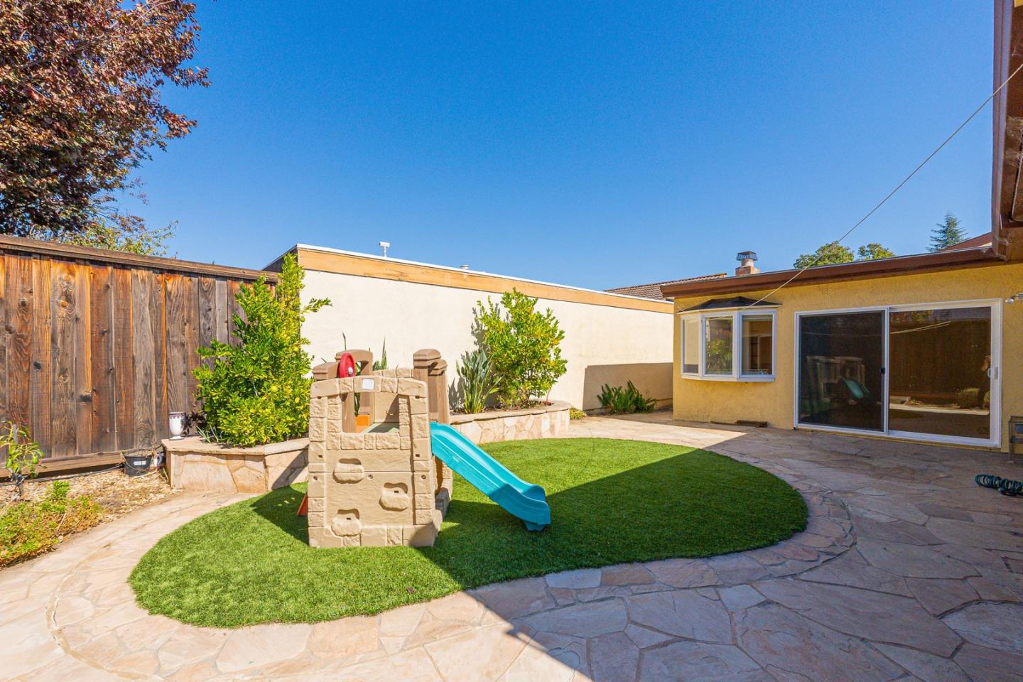 3691 Dryden Road Fremont, CA 94555 - Photo 25 of 26 a view of a house with backyard and porch