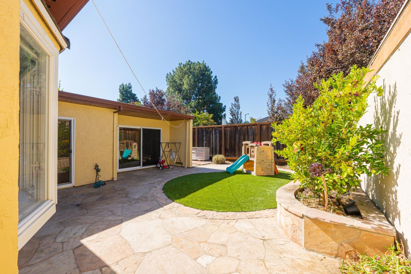 3691 Dryden Road Fremont, CA 94555 - Photo 26 of 26 a view of a house with backyard and sitting area