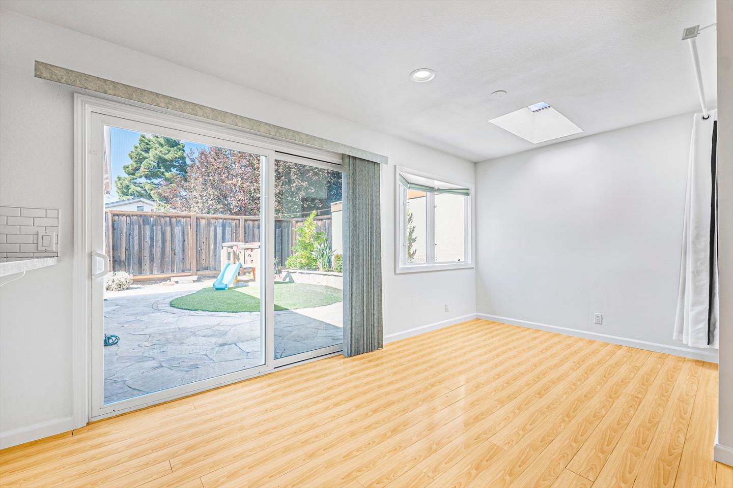 3691 Dryden Road Fremont, CA 94555 - Photo 5 of 26 a big room with wooden floor and windows