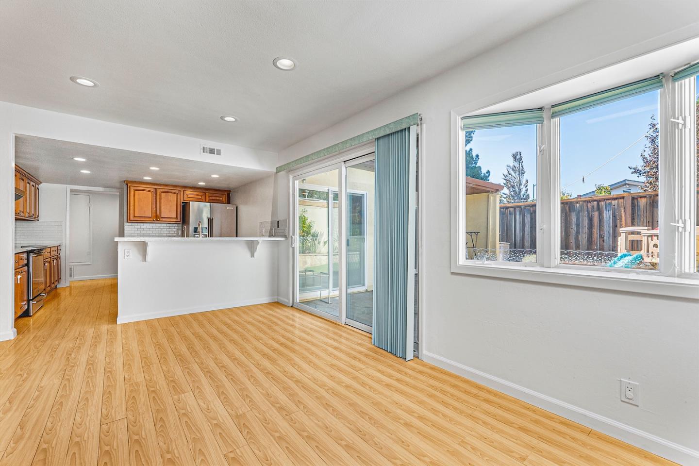3691 Dryden Road Fremont, CA 94555 - Photo 7 of 26 a view of a kitchen with wooden floor and a window