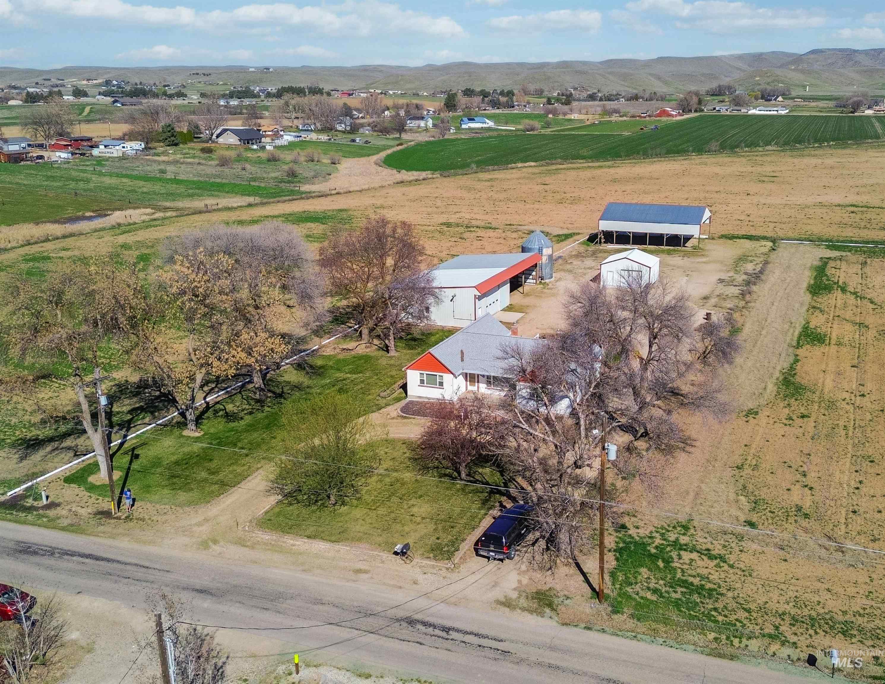 350 East Central Road Emmett, ID 83617 - Photo 2 of 10 Aerial view of sparsely populated area with mountains
