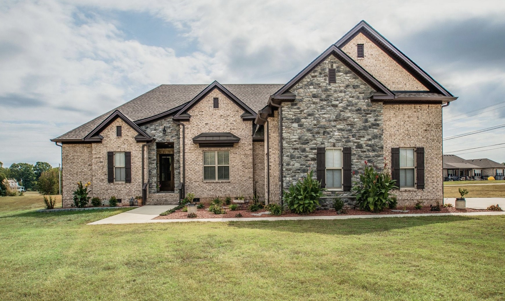 900 Sam Johnson Road Columbia, TN 38401 - Photo 1 of 41 a front view of house with yard and green space