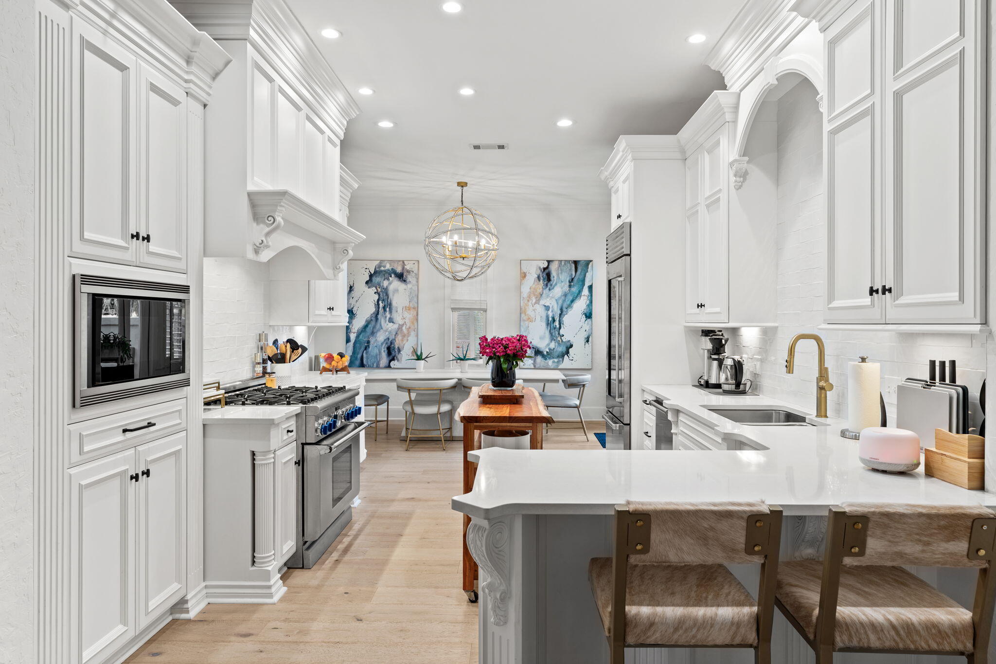 1821 Baytowne Avenue Miramar Beach, FL 32550 - Photo 14 of 63 a kitchen with cabinets a sink and appliances