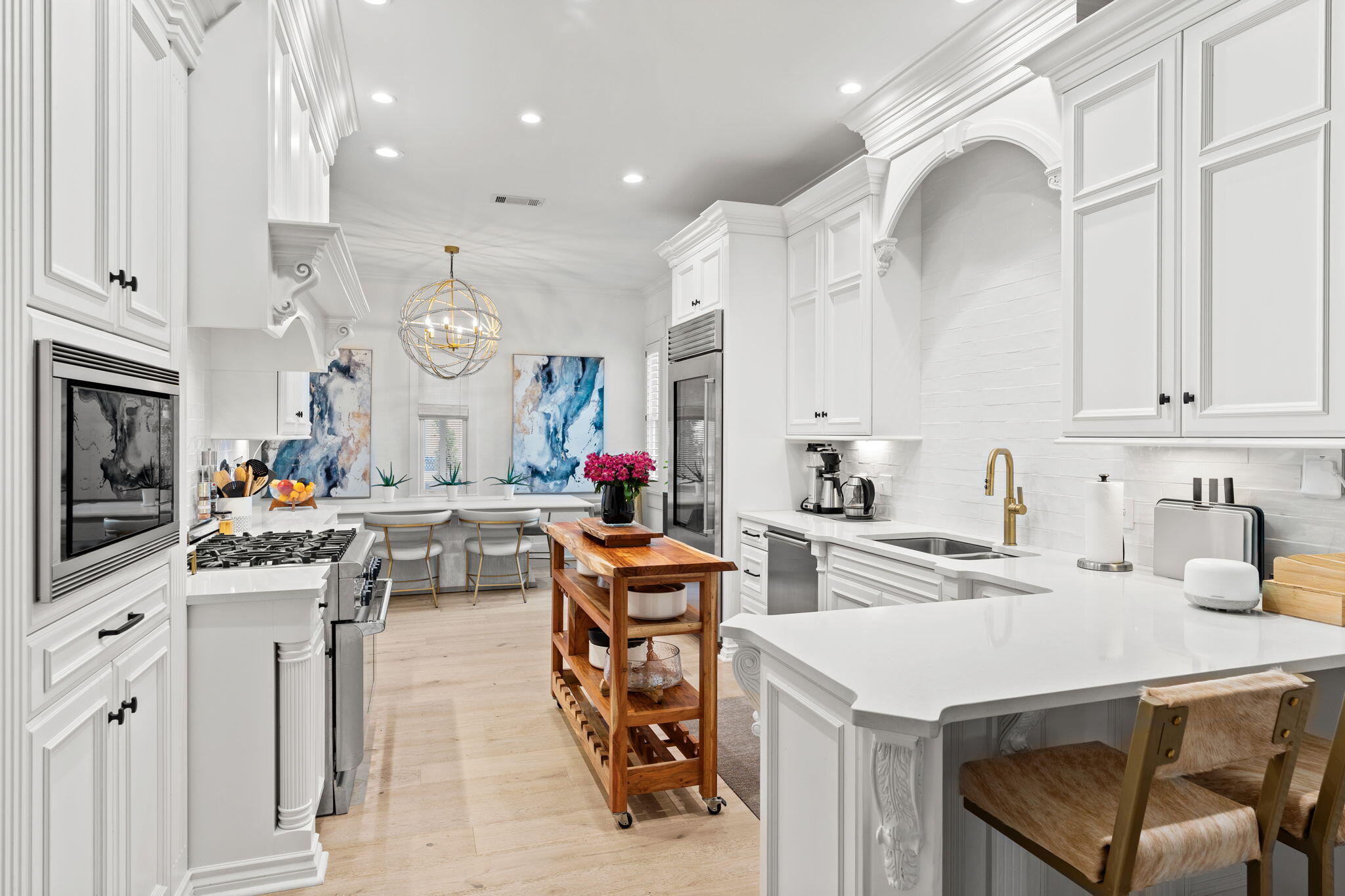 1821 Baytowne Avenue Miramar Beach, FL 32550 - Photo 15 of 63 a kitchen with cabinets and chairs