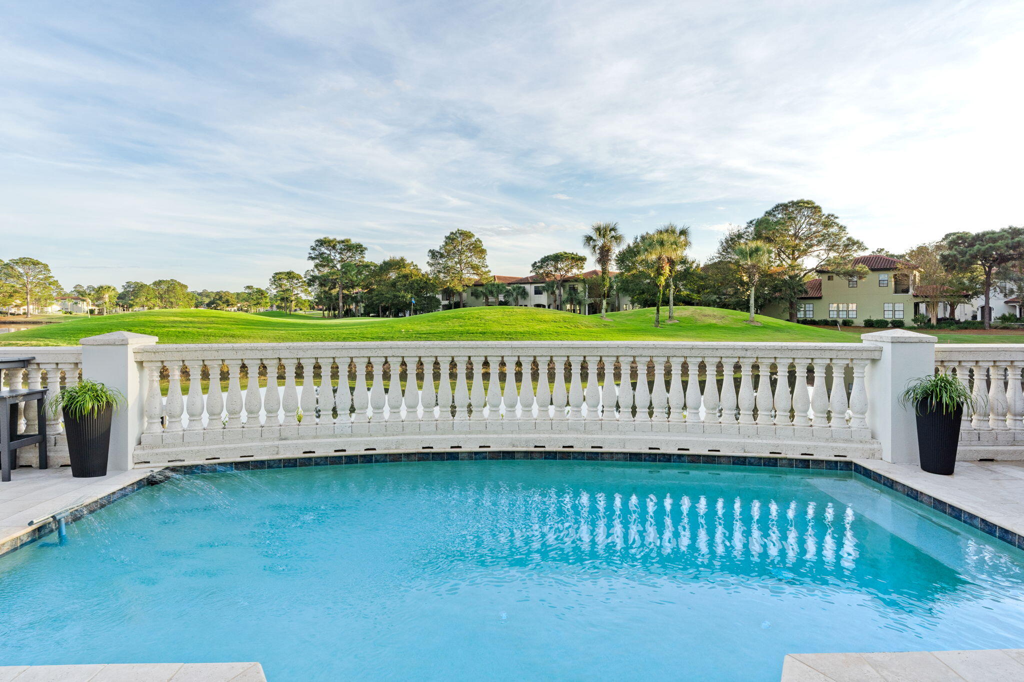 1821 Baytowne Avenue Miramar Beach, FL 32550 - Photo 2 of 63 a view of a wooden deck with a bench