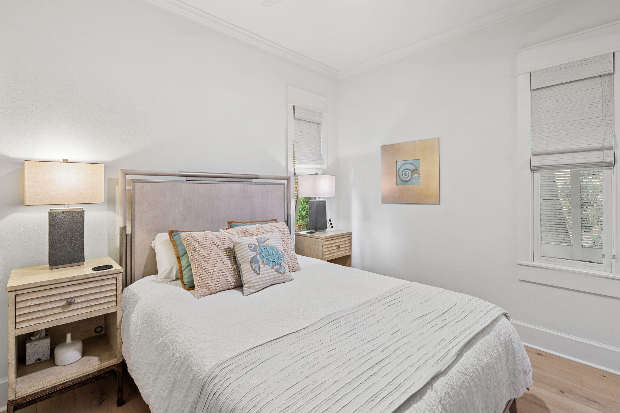 1821 Baytowne Avenue Miramar Beach, FL 32550 - Photo 23 of 63 a bedroom with a bed and a window