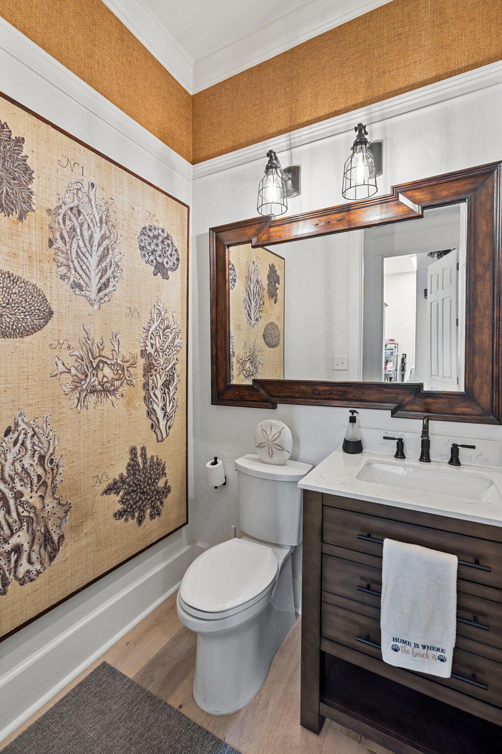 1821 Baytowne Avenue Miramar Beach, FL 32550 - Photo 25 of 63 a bathroom with a toilet sink and mirror