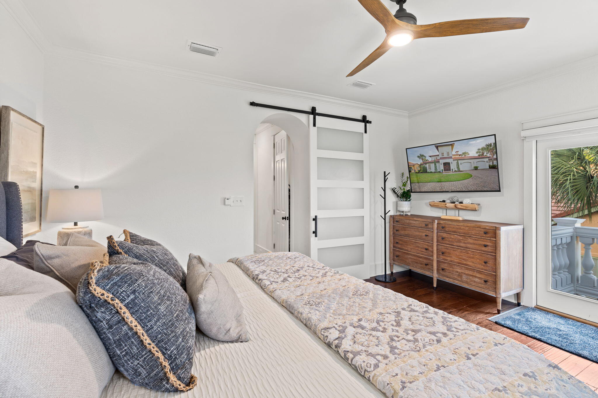 1821 Baytowne Avenue Miramar Beach, FL 32550 - Photo 36 of 63 a bedroom with a bed and cabinets