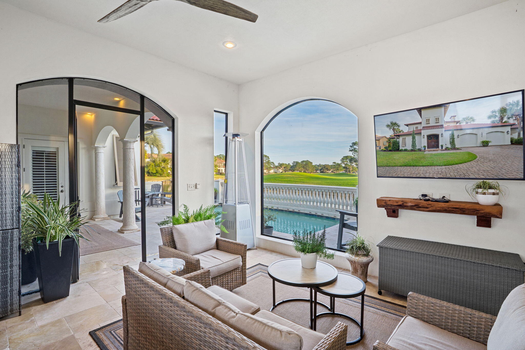 1821 Baytowne Avenue Miramar Beach, FL 32550 - Photo 42 of 63 a living room with furniture and painting on the wall