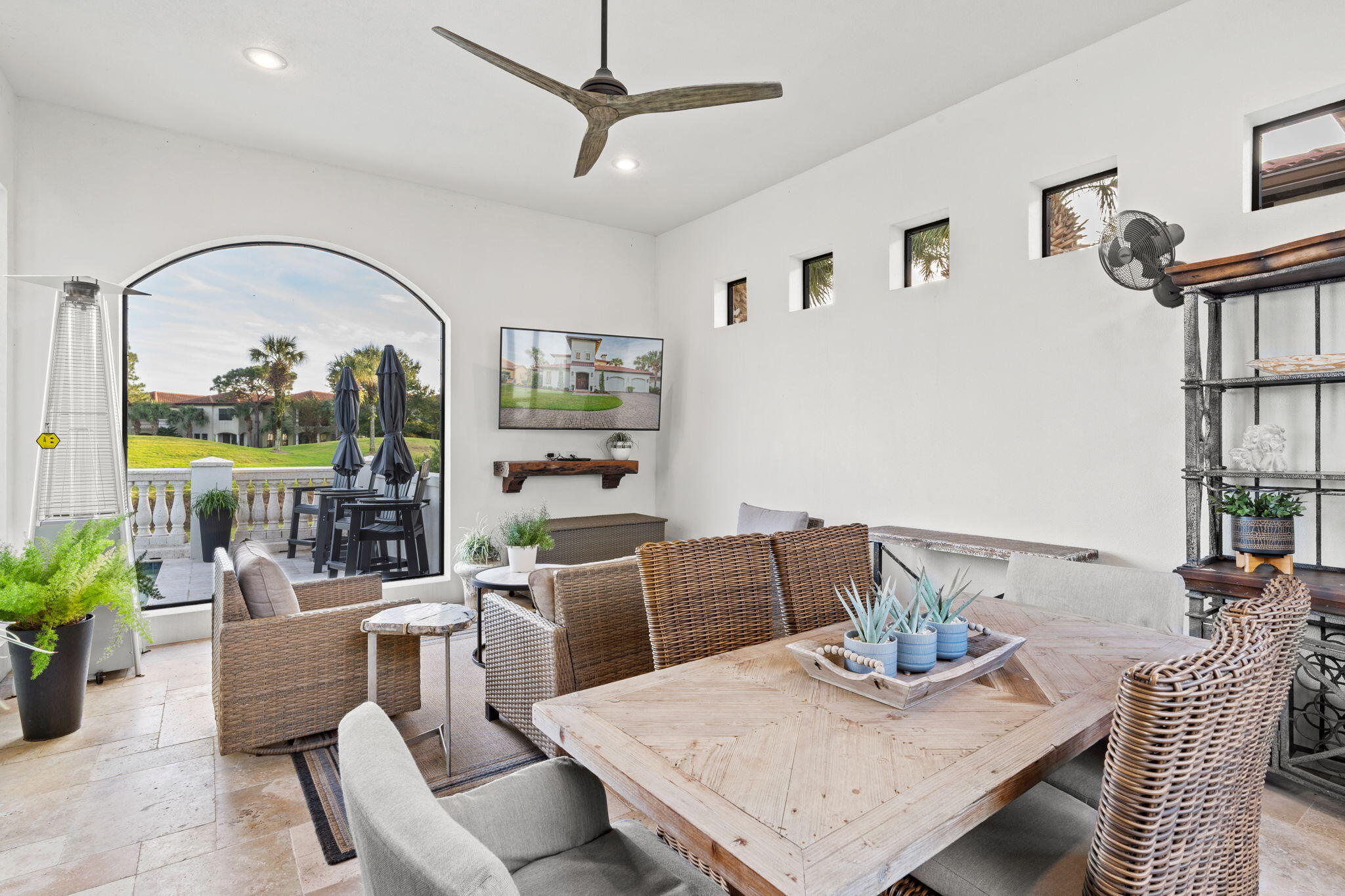 1821 Baytowne Avenue Miramar Beach, FL 32550 - Photo 44 of 63 a living room with furniture a rug and a potted plant