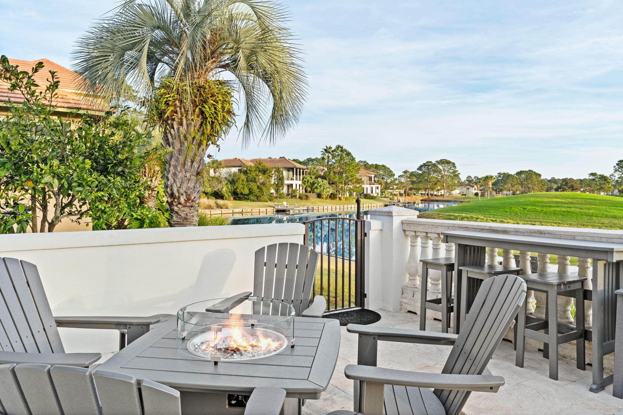 1821 Baytowne Avenue Miramar Beach, FL 32550 - Photo 48 of 63 a view of a balcony with furniture and a potted plant