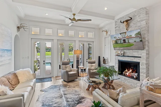 a living room with furniture and a rug