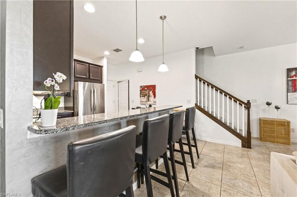 19540 Bowring Park Road, Unit 101 Fort Myers, FL 33967 - Photo 17 of 46 Kitchen with peninsula