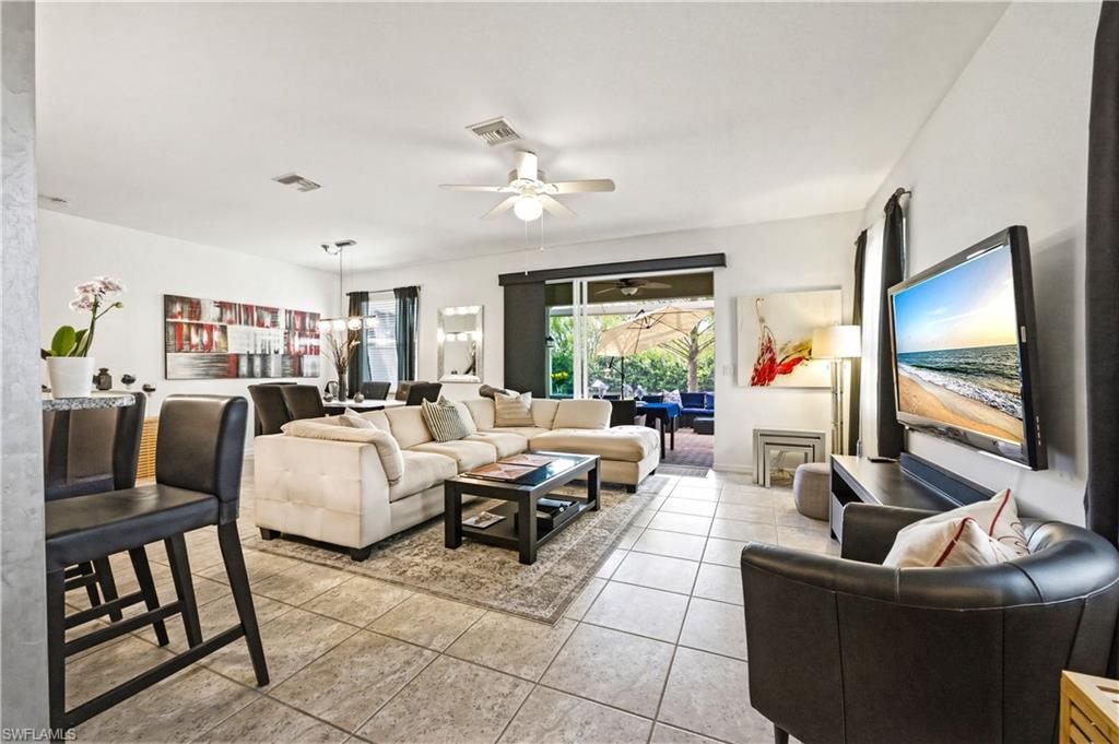 19540 Bowring Park Road, Unit 101 Fort Myers, FL 33967 - Photo 8 of 46 Living room view from the entry hallway