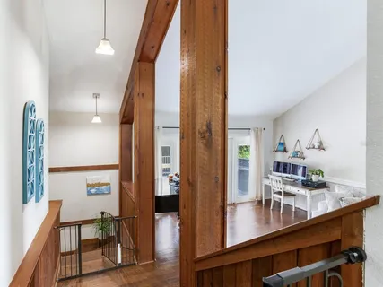 a view of a living room and dining room