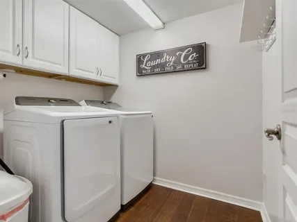 a bed room with a bed and a tv