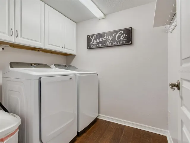 a bed room with a bed and a tv