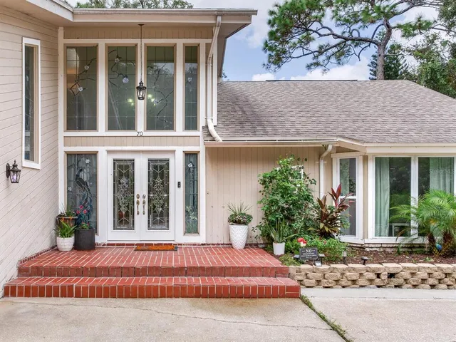 a house view with a outdoor space