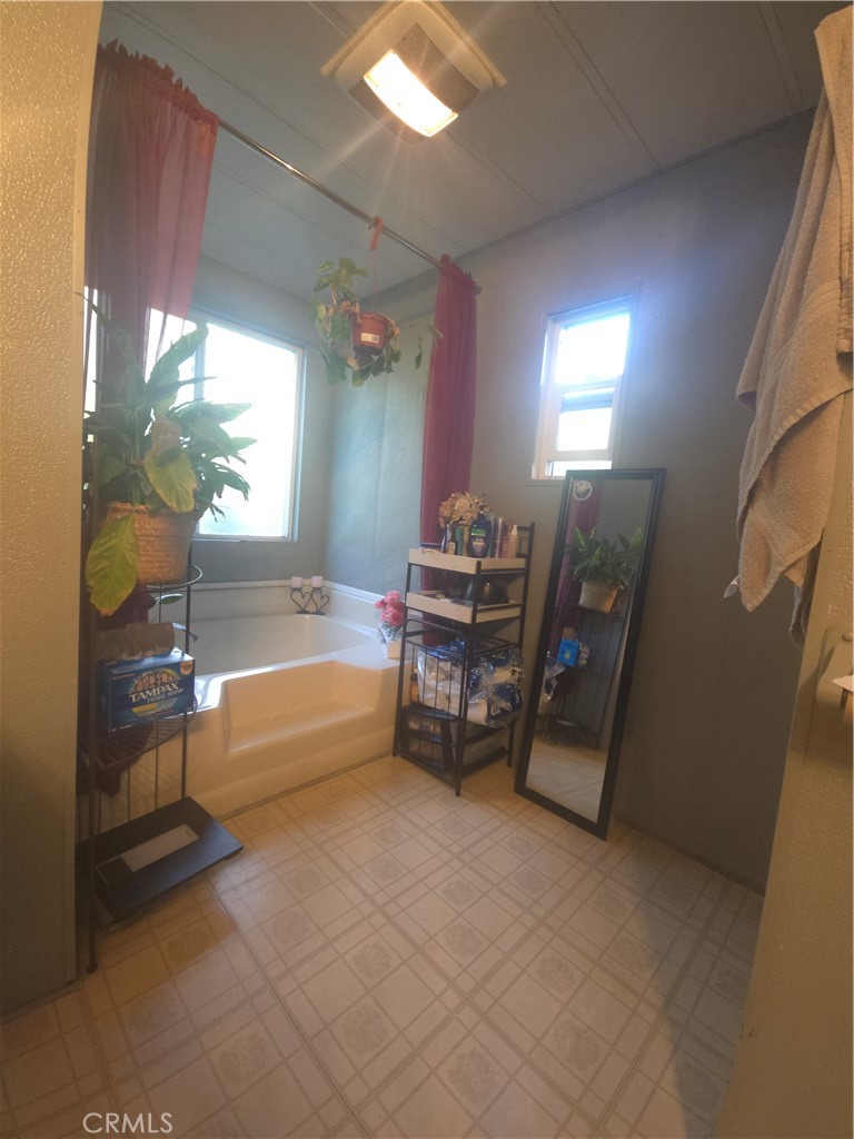 3114 Manzanita Road Nice, CA 95464 - Photo 6 of 10 a living room with furniture and a large window