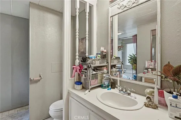 a view of a kitchen with sink dryer and washer