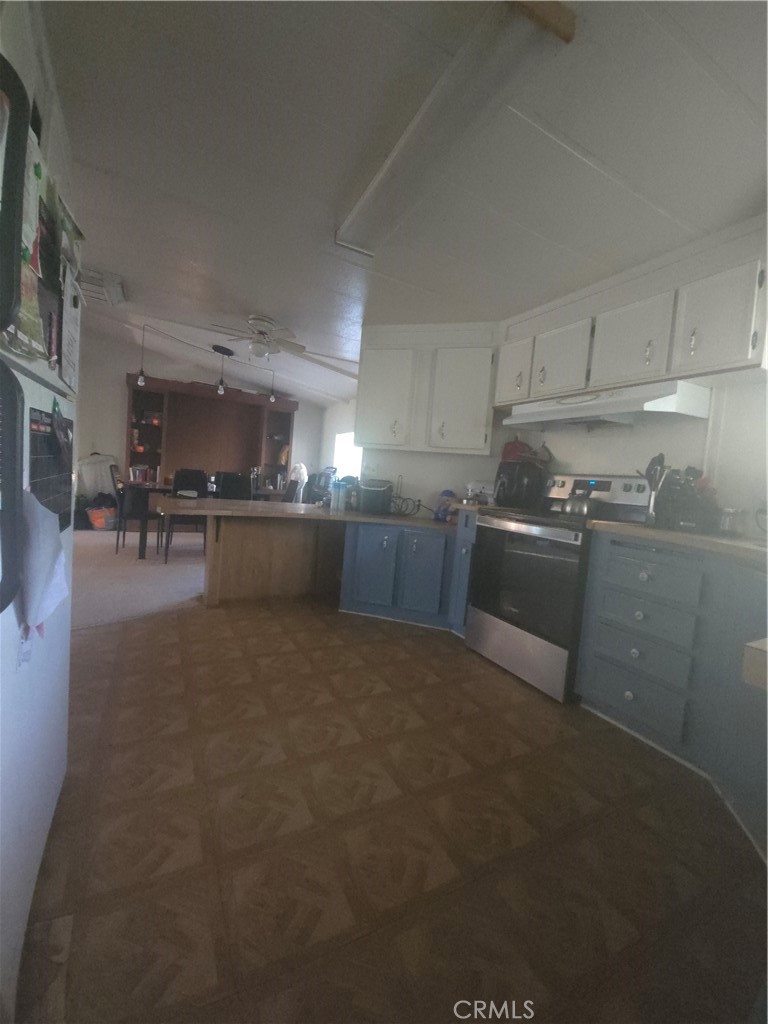 3114 Manzanita Road Nice, CA 95464 - Photo 9 of 10 a kitchen with stainless steel appliances granite countertop a sink stove and cabinets