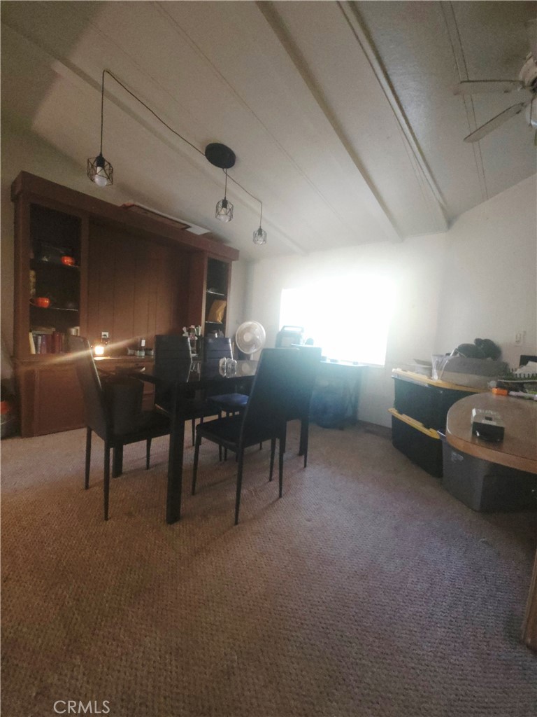 3114 Manzanita Road Nice, CA 95464 - Photo 10 of 10 a living room with furniture and a potted plant