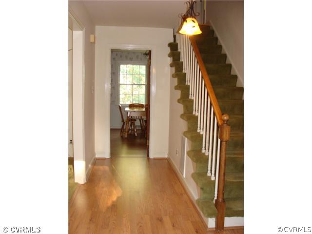 1323 Covington Road Colonial Heights, VA 23834 - Photo 2 of 12 a view of a hallway with wooden floor