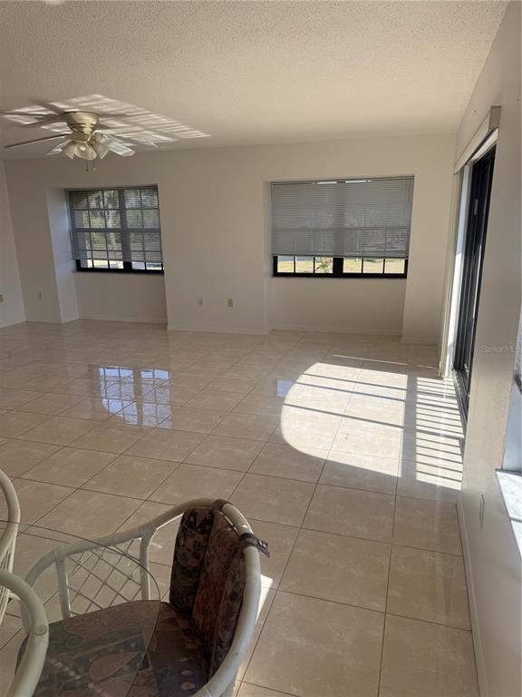23465 Harbor View Road, Unit 201 Punta Gorda, FL 33980 - Photo 20 of 50 a bathroom with a sink a toilet and mirror