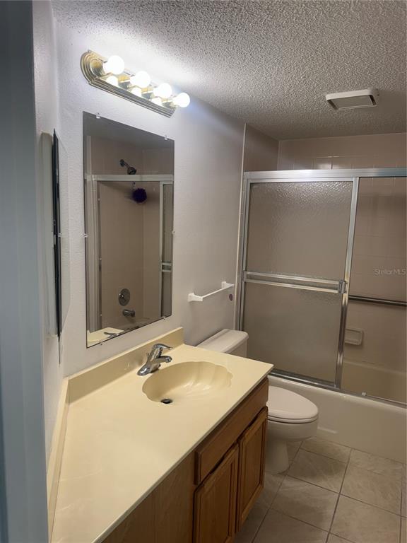 23465 Harbor View Road, Unit 201 Punta Gorda, FL 33980 - Photo 23 of 50 a bathroom with a sink toilet and shower