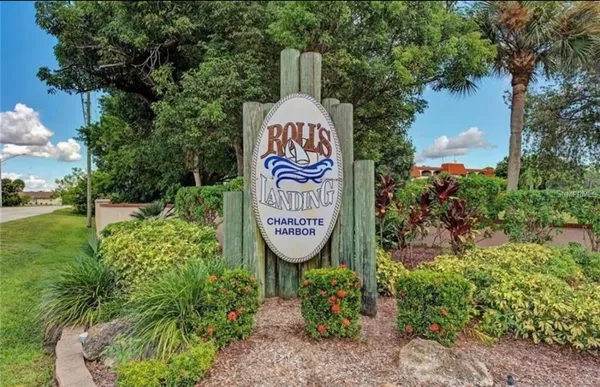 a view of a sign board with a park