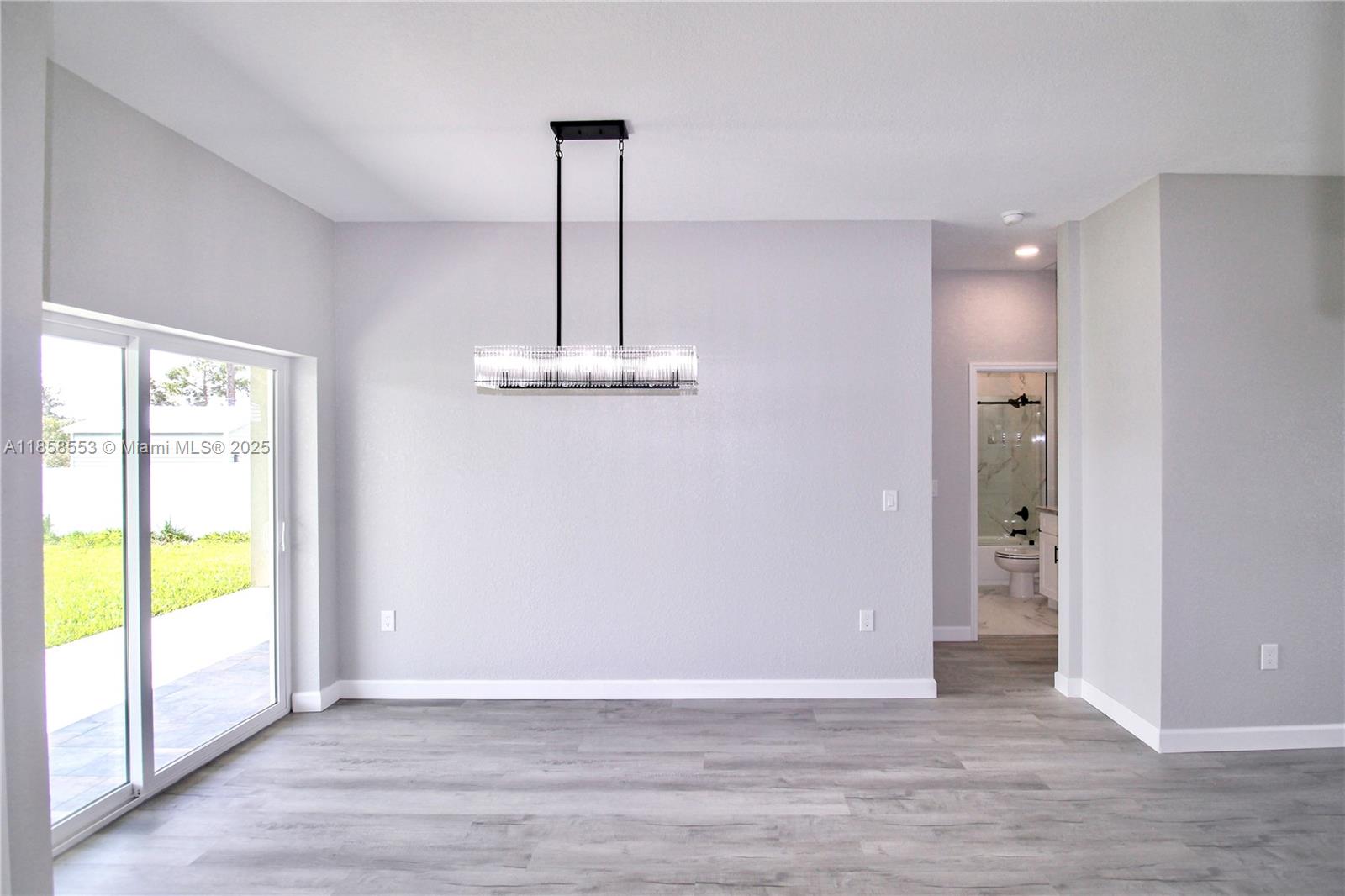 4631 Mignon Drive Sebring, FL 33872 - Photo 17 of 40 a view of an empty room with a window