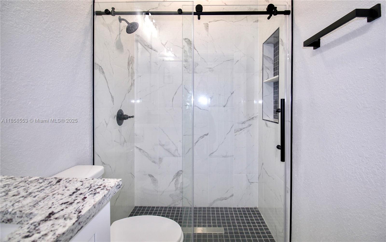 4631 Mignon Drive Sebring, FL 33872 - Photo 32 of 40 a bathroom with a sink toilet and shower