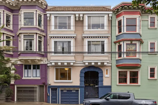 a front view of a multi story building