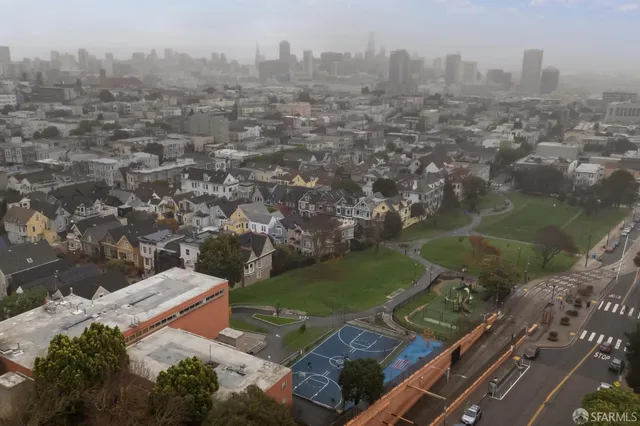 a picture of a bench in front of a building