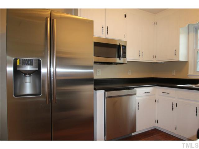 1685 Jack Road Clayton, NC 27520 - Photo 3 of 14 Completely updated kitchen with new stainless steel appliances, counter top and laminate flooring